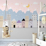 Pink sky mountain mural bringing warmth to a child's reading nook