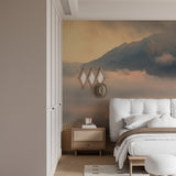 Misty mountain wallpaper creating atmosphere in a meditation room