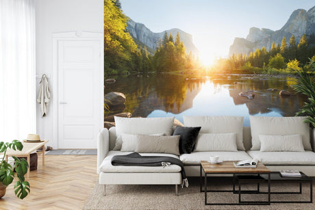 Mountain lake wallpaper creating depth in modern living room, morning light streaming through windows