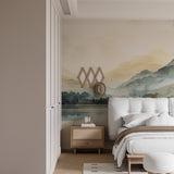 Watercolor mountain mural in master bedroom, soft morning light enhancing blues
