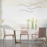 Abstract mountain mural creating depth in minimalist bedroom