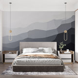 Modern geometric mountain wallpaper with gradient design shown in a minimalist living room with natural light