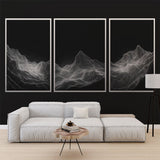 Modern mountain line art wallpaper creating depth in a minimalist living room with clean furniture and natural light