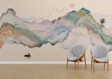 Watercolor mountain mural adding depth to a serene bedroom with natural light