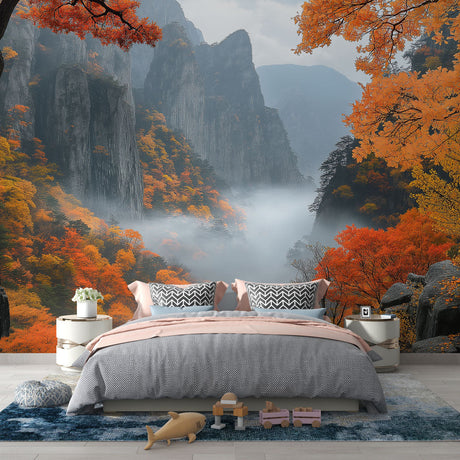 Mountain mural wallpaper with autumn colors shown in a modern living room, soft morning light highlighting the foggy valley scene