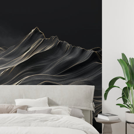 Black and gold mountain wallpaper in modern living room with grey sofa