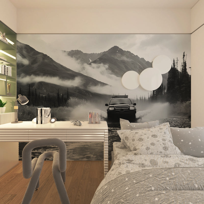 Adventure theme wall mural in contemporary living space with dramatic black and white mountains