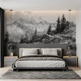 Mountain mural wallpaper creating depth in a modern living room, black and white alpine peaks above grey sofa