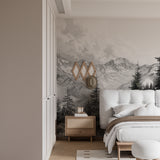 Black and white mountain wallpaper in minimal dining room, dramatic peaks complement modern furniture