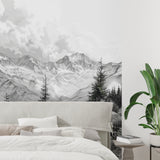 Mountain range wallpaper making statement in hallway, dramatic black and white peaks create depth