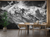 Black and white mountain mural in minimalist bedroom with wooden accents