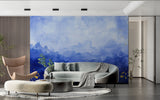Blue mountain mural with golden details brightening master bedroom wall
