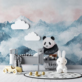 Dreamy panda nursery wallpaper in pink and blue tones shown in baby girl's room