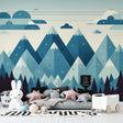 Mountain landscape wallpaper creating a serene atmosphere in a modern living room with blue geometric peaks and clean lines