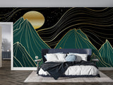 Green and gold mountain wallpaper in dining room with pendant lighting highlighting metallic elements