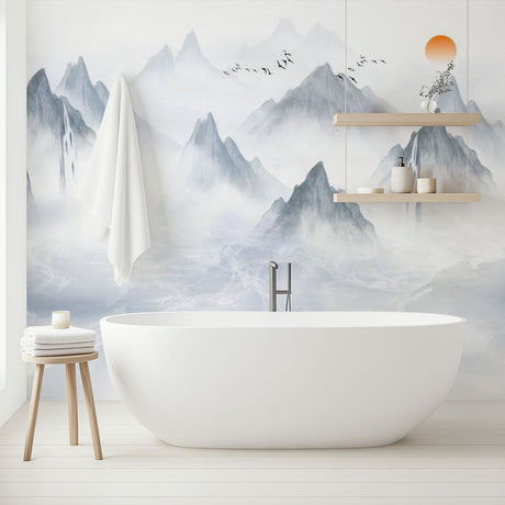 Mountain landscape wallpaper creating a peaceful atmosphere in a modern living room with minimal furniture