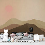 Mountain sunset wallpaper creating cozy atmosphere in reading nook