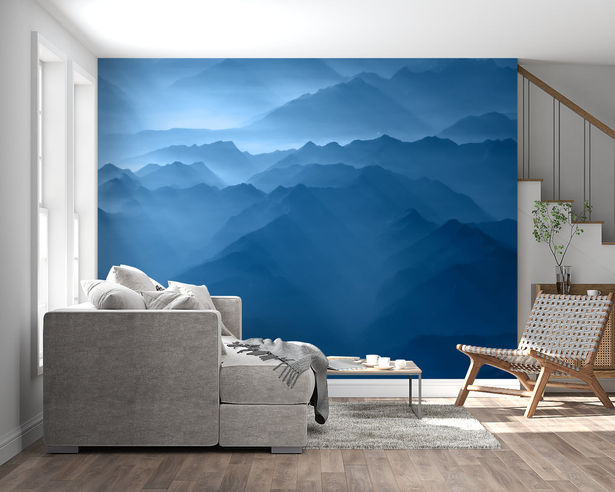 Misty mountain peaks wallpaper in dining room with modern lighting