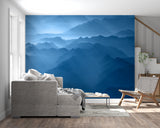 Misty mountain peaks wallpaper in dining room with modern lighting