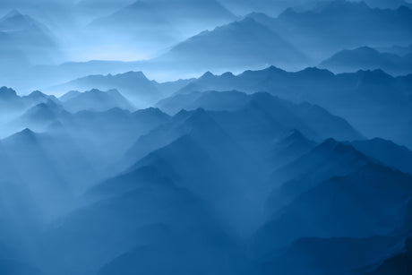 Mountain range wallpaper design file showing full misty blue peaks pattern