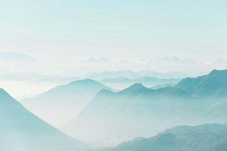 Mountain landscape design file showing full watercolor pattern in misty blue tones