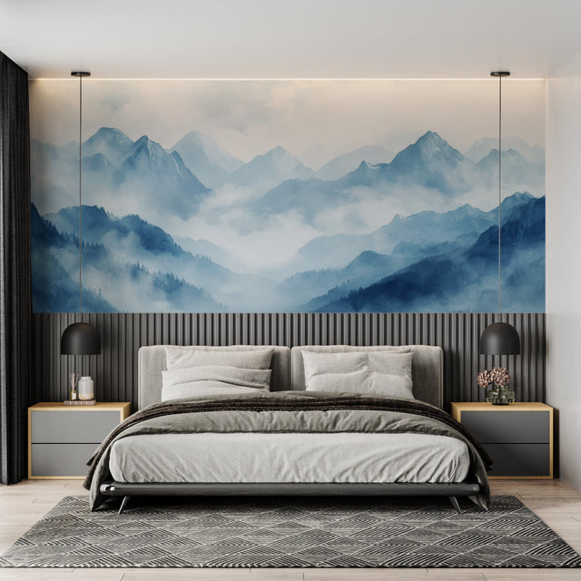 Mountain mural wallpaper creating depth in modern living room with blue accents