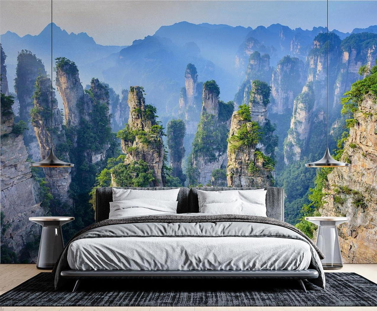 Misty mountain peak wallpaper making home office feel spacious and inspiring