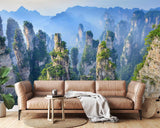 Nature wall mural of mountain peaks transforming dining room atmosphere
