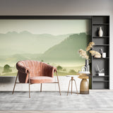 Mountain wall mural showcased in a minimalist home office with desk and chair