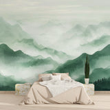 Green mountain mural adding depth to a dining room with soft lighting