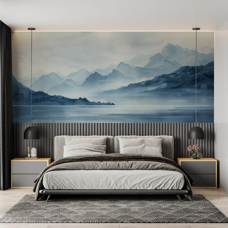 Mountain landscape wallpaper creating depth in modern living room with grey sofa