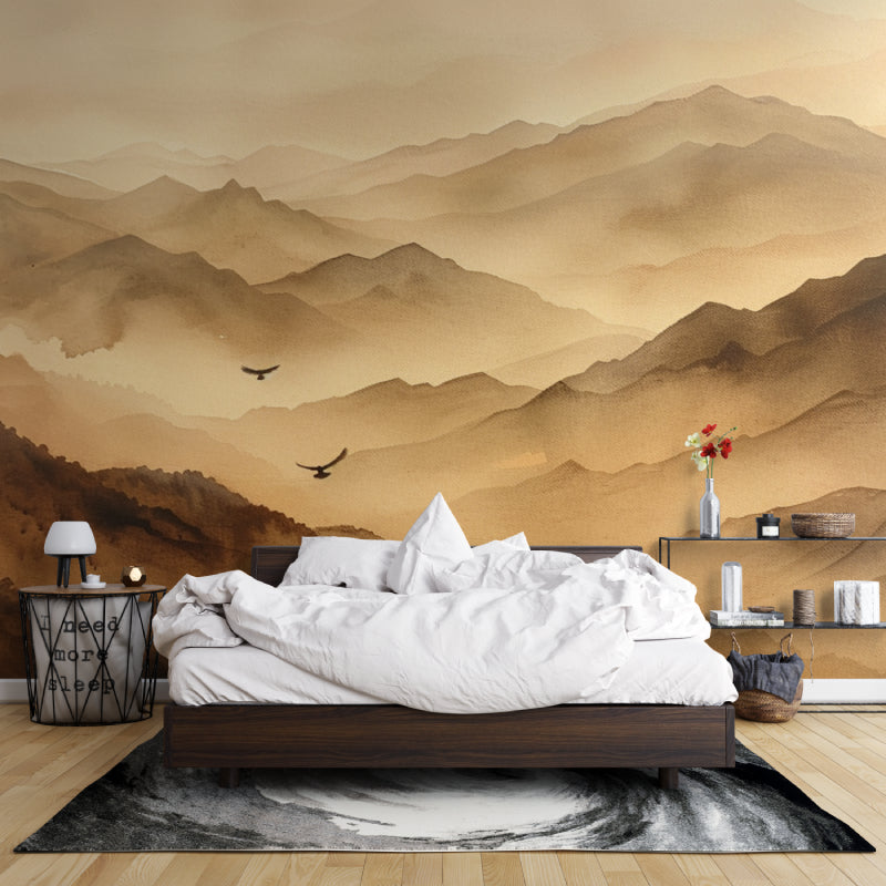 Peaceful bedroom featuring mountain landscape wallpaper with soft terracotta hues