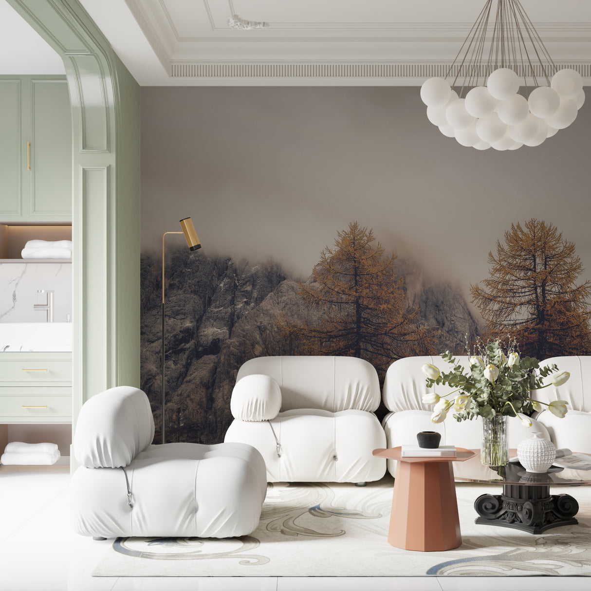 Mountain landscape wallpaper creating depth in modern living room with grey sofa and natural decor
