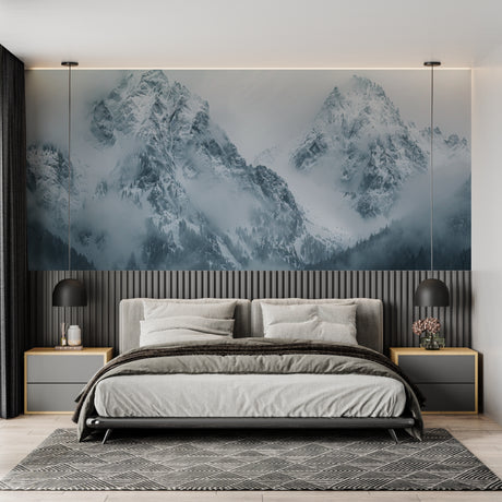 Mountain landscape wallpaper creating depth in modern living room with grey sofa and natural light