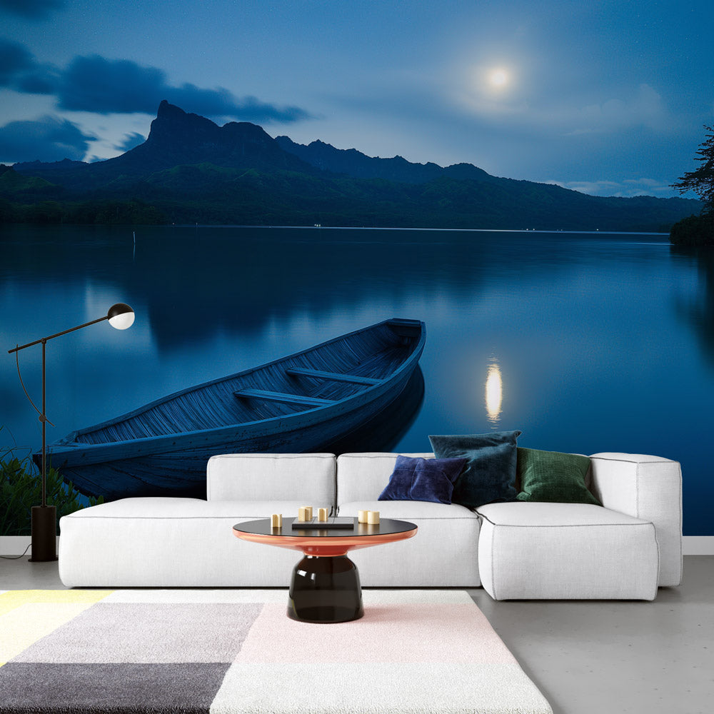 Mountain lake wallpaper in modern living room creating peaceful atmosphere with moonlit boat scene
