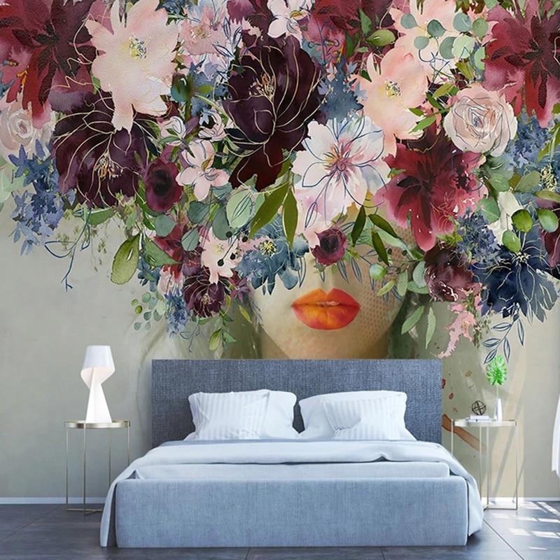 Pastel mountain mural creating depth in cozy bedroom setting