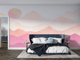 Pink sunset mountain wallpaper in a home office space with natural lighting