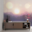 Mountain landscape wallpaper in modern living room, purple sunset tones creating peaceful atmosphere