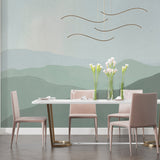 Green mountain mural in minimalist bedroom showing peaceful atmosphere