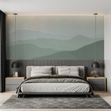 Serene mountain wallpaper installation in home office with wooden desk
