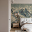 Mountain landscape wallpaper in modern living room creating depth and serenity