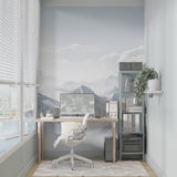 Mountain wall mural in modern living room showing scale of snowy peaks design