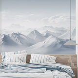 Watercolor mountain wallpaper in cozy bedroom creating peaceful atmosphere