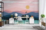 Abstract mountain mural adding warmth to cozy bedroom with natural light