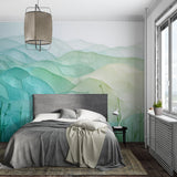 Watercolor mountain design in meditation room emphasizing soothing green gradient effect