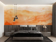 Mountain sunset mural wallpaper in modern living room showing orange and beige tones
