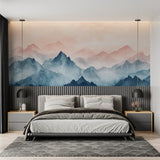 Watercolor mountain wallpaper adding depth to a cozy living room with natural light