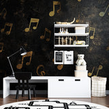 Music themed wall mural in a piano room, showing gold notes on black background