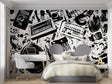 Music themed wallpaper in modern recording studio showing black and white instrument pattern