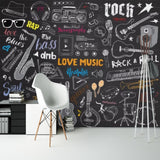 Music themed wallpaper creating a cool vibe in a modern teen bedroom, with dark chalkboard background and colorful musical elements